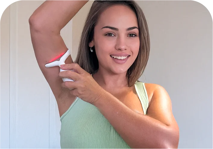Kimberly using the MyoGlow device on her arm